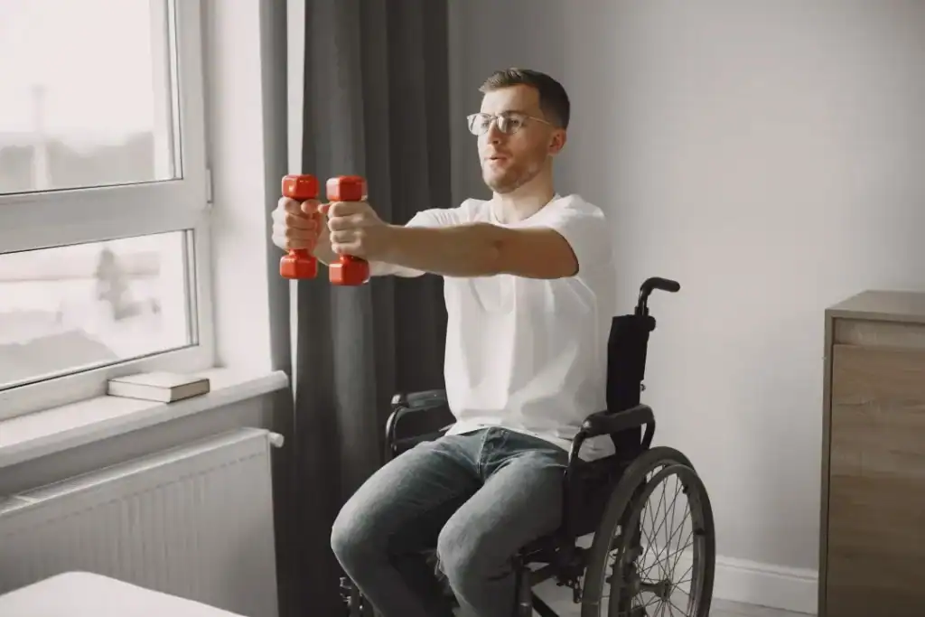 Image of man doing exercise in his wheelchair to aid weight loss Calne