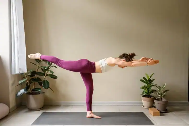 Achieving the Perfect Tone: How Often Should You Exercise for Results? 1 Woman doing Yoga exercise Calne to help with toning the body.