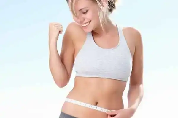 Unraveling the Mystery: Where Does the Body Fat Loss From First? 3 Image of woman happy with fat loss Calne