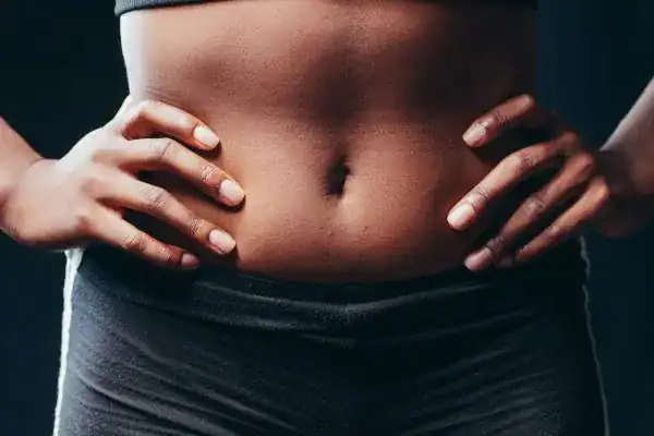Toning Your Stomach: The Ultimate Guide to Achieving a Sculpted Stomach While Shedding Pounds 1 Image of a toned stomach after non surgical treatment Calne