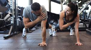 Sculpting Sleek Arms: The Essential Role of Cardio in Toning Without Bulking Up 1 Image of man and woman doing Cardio Calne to tone their arms.